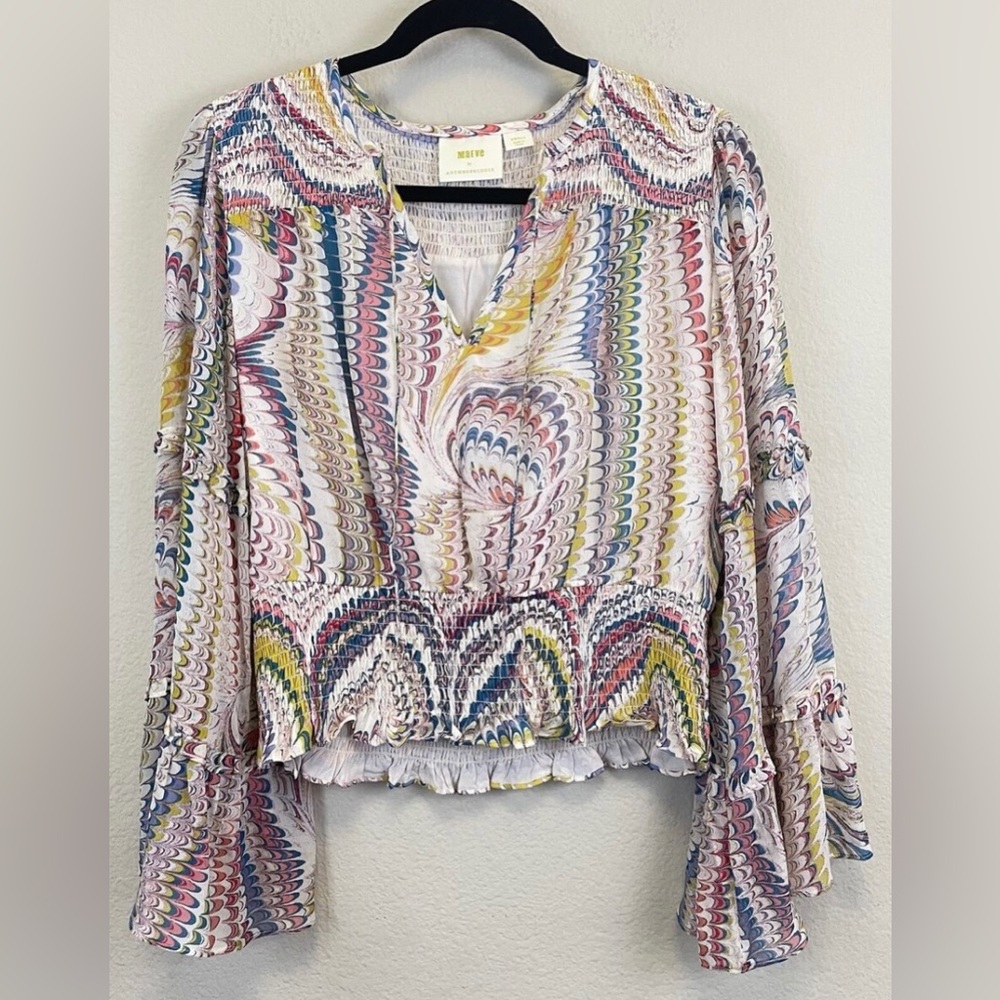Mauve anthropologie blouse with sweeping bell sleeves for a 70’s feel